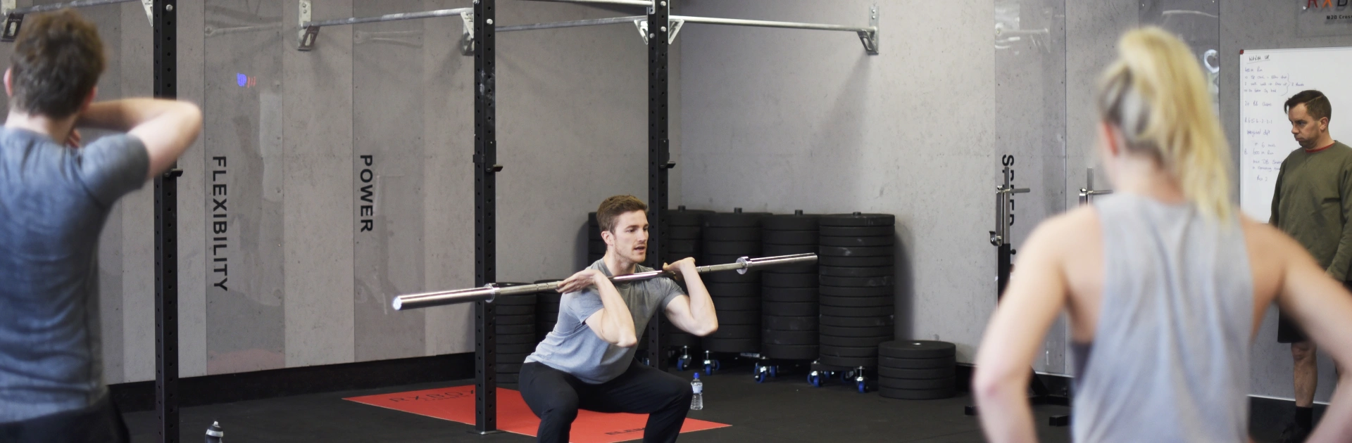 man with weight bar